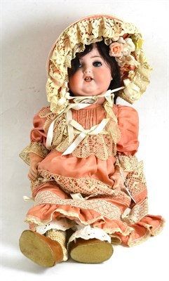 Lot 232 - An Armand Marseille 996 doll with remade dress made in the 1960's