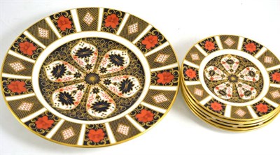 Lot 234 - A Royal Crown Derby Imari pattern dinner plate and six side plates