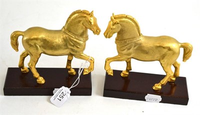 Lot 251 - Pair of cast copper and gold plated San Marco horse ornaments