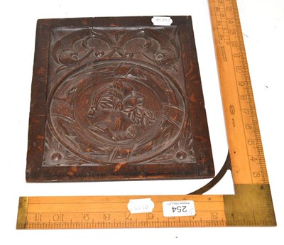 Lot 254 - A set square and a carved oak panel