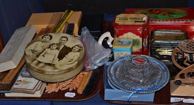 Lot 264 - Co-operative interest: two trays including biscuit tings, ashtrays, Wedgwood centenary dish, postal