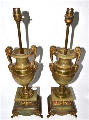 Lot 294 - A pair of green onyx and gilt brass urns, circa 1900, now as lamps