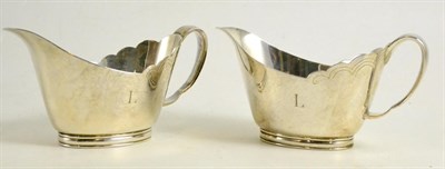 Lot 314 - A pair of silver sauce boats