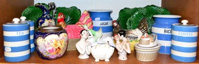 Lot 333 - Cornish storage jars, Staffordshire hen basket, pin dolls and Majolica