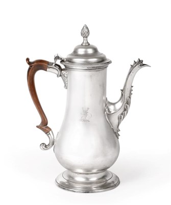 Lot 476 - A George III Silver Coffee Pot, John King, London, 1776, of plain baluster form with foliate...