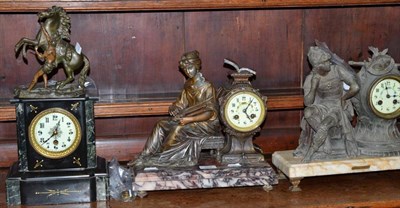 Lot 359 - Three clocks, two on marble bases, all with keys and pendulums; and a spelter horse and handler...