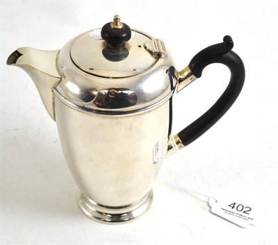 Lot 402 - A silver hot water jug