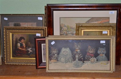 Lot 427 - After Louis Wain, a collection of five prints together with an oil on board of two cats signed...