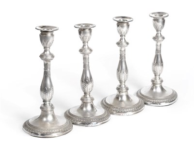 Lot 489 - A Set of Four George III SIlver Candlesticks, John Younge & Co, Sheffield 1785, the circular...