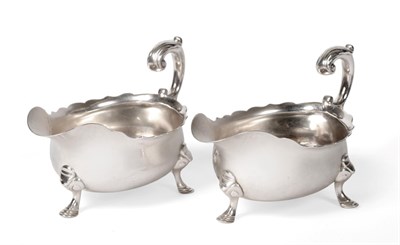 Lot 490 - A Pair of George II Silver Sauceboats, maker's mark rubbed, London 1746, with shaped rim, leaf...