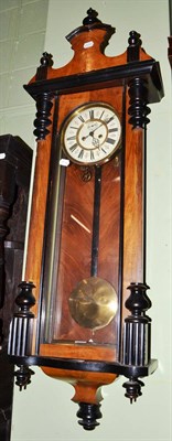 Lot 480 - Walnut cased Vienna wall clock with ebonised detail