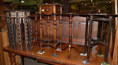 Lot 485 - Two tripod occasional tables, oak plant stand, occasional table with carved top and an Eastern...