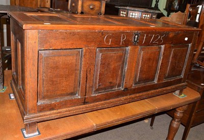 Lot 491 - An 18th century panelled oak blanket chest, carved 'G R 1725'