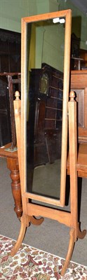 Lot 492 - An oak framed cheval mirror