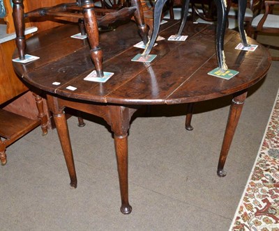 Lot 493 - A 17th/18th century oak pad foot gateleg table