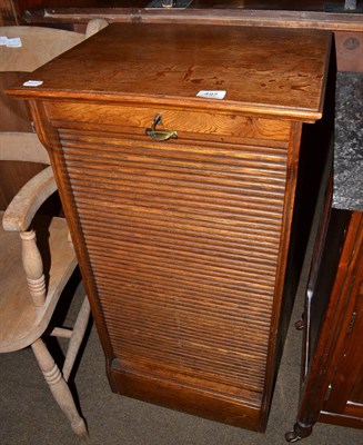 Lot 497 - An oak office cabinet with tambour front