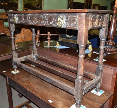 Lot 510 - A 19th century carved oak side table with single drawer