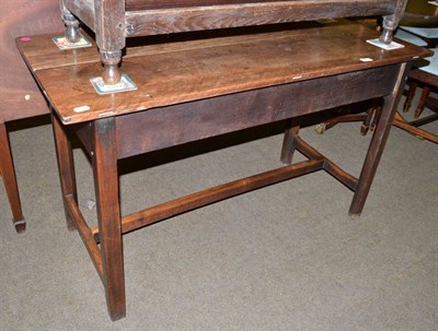 Lot 511 - A 19th century mahogany side table with stretcher base