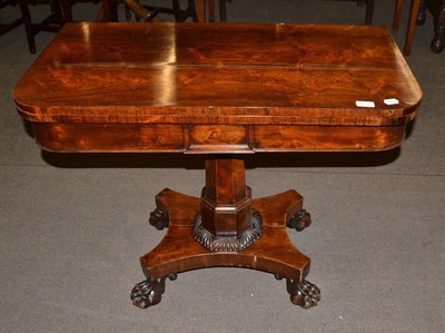 Lot 519 - A 19th century rosewood fold over games table