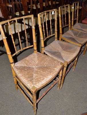 Lot 527 - Set of four painted bamboo chairs