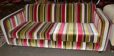 Lot 531 - A modern velvet striped two seater sofa NB: Bought in 2002, re-upholstered in 2013, bears so no...