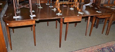 Lot 551 - A 19th century mahogany D-end dining table with centre section