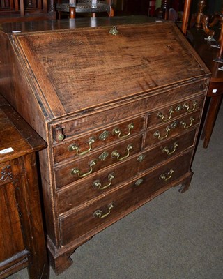 Lot 558 - An 18th century oak bureau