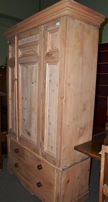 Lot 575 - A pine single wardrobe