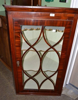 Lot 580 - Victorian mahogany glazed hanging corner cabinet