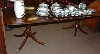 Lot 596 - A Regency style mahogany dining table