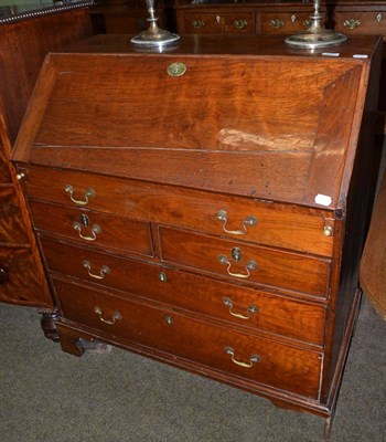 Lot 597 - Mid-18th century red walnut bureau with inner key