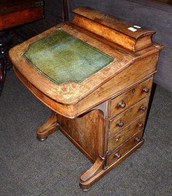 Lot 601 - A Victorian walnut and inlaid Davenport