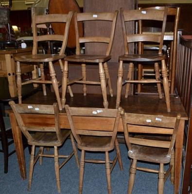 Lot 633 - Victorian pine kitchen table and six assorted pine chairs