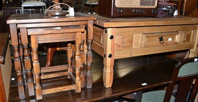 Lot 634 - Modern pine coffee table, oak nest of three occasional tables and a glazed oak cabinet