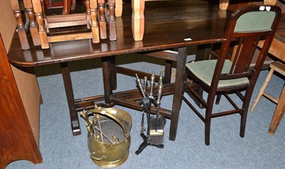 Lot 635 - Oak drop-leaf table, brass coal bucket and fire irons, two table lamps, Cosser radio, oak...