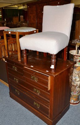 Lot 637 - An Edwardian walnut three height chest of drawers, a late Victorian nursing chair, piano stool,...