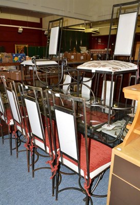 Lot 639 - Modern glass top iron table with ten similar chairs and a X-framed seat