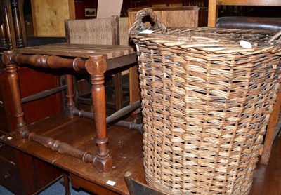 Lot 645 - A 19th century oak luggage stand, wicker log basket, rush seated corner chair, bentwood chair,...