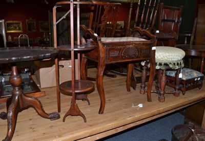 Lot 652 - Mahogany piecrust tripod table, piano stool, two other stools, oval coffee table, cake stand...