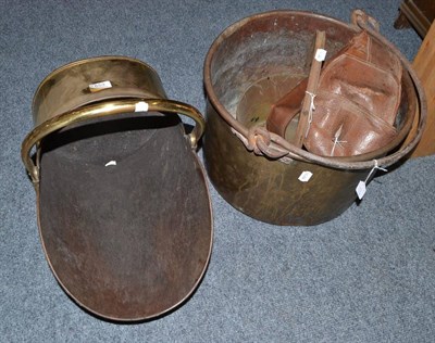 Lot 653 - Brass jam pan, large pan with handle, brass coal hod and leather gun case