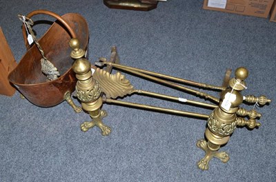 Lot 654 - A set of fire irons, coal scuttle, door stop, pair of fire dogs