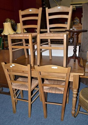 Lot 658 - Pine kitchen table and four chairs