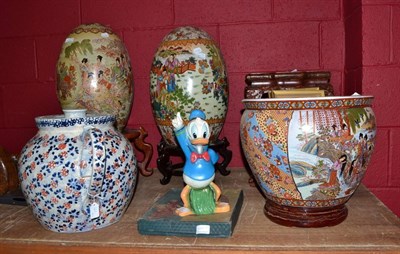 Lot 662 - Japanese jardiniere, two egg shapes vases, wooden stand, Mickey Mouse figure, weaving toy, two...