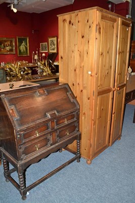 Lot 681 - Modern small pine two-door wardrobe and an oak bureau