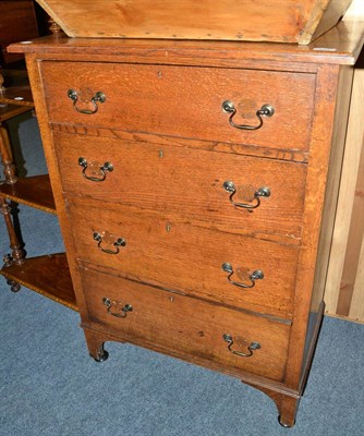 Lot 683 - A light oak four height chest of drawers