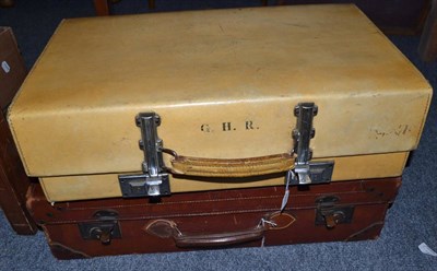 Lot 743 - Three leather suitcases