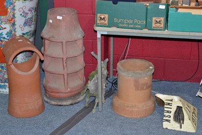 Lot 776 - Three chimney pots, a white painted Masham road sign and a spelter figure of a horseman (5)