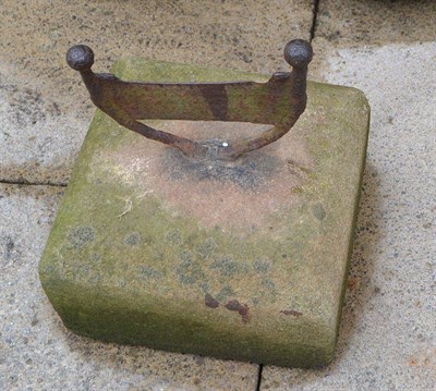 Lot 801 - Cast iron boot scraper on stone base