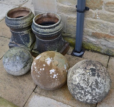 Lot 803 - Three reconstituted stone ball finials and two chimney pots