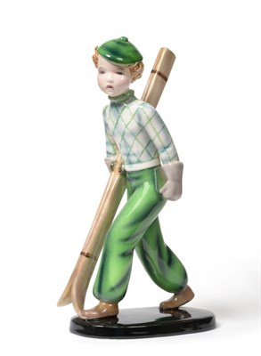 Lot 532 - An Art Deco Goldscheider Figure, designed by Stefan Dakon, circa 1937, model 7562, a boy skier...